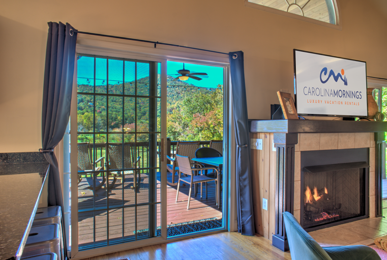 Living Area w/ Covered Deck Access