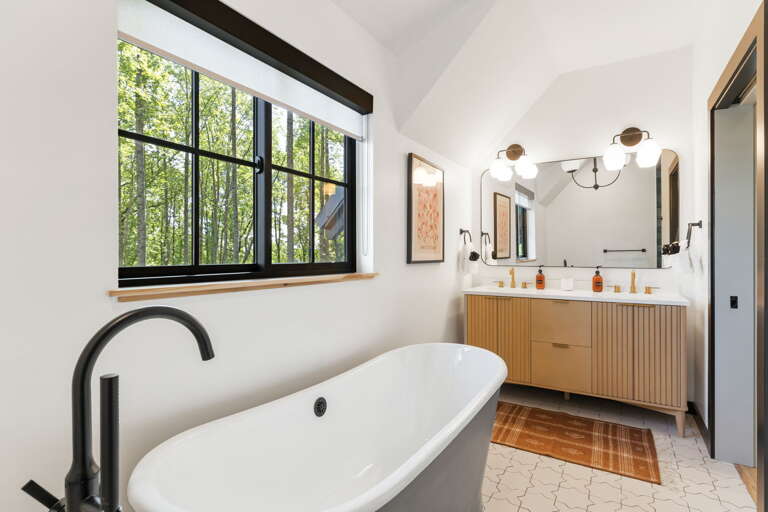 Main Suite/Bedroom Two - Attached Full Bath w/ Soaking Tub