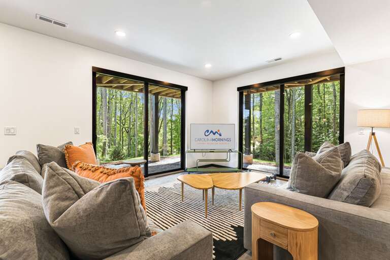 Lower Level - Living Area w/ Smart TV & Wooded Views