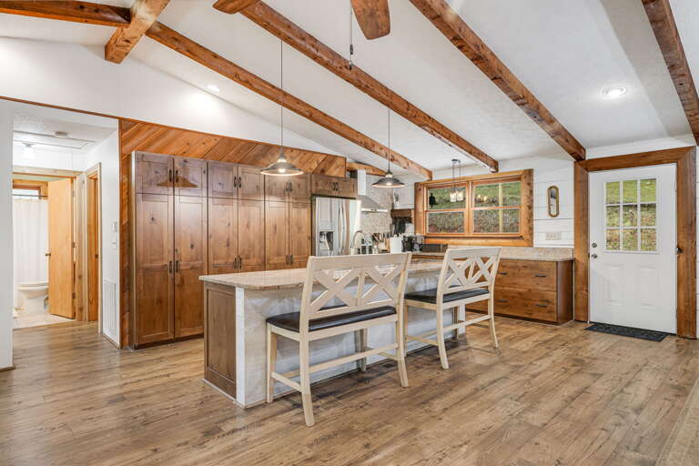 Chef's Gourmet Kitchen w/ Breakfast Bar Seating & Stainless Steel Appliances Chef's Gourmet Kitchen w/ Breakfast Bar Seating & Stainless Steel Appliances