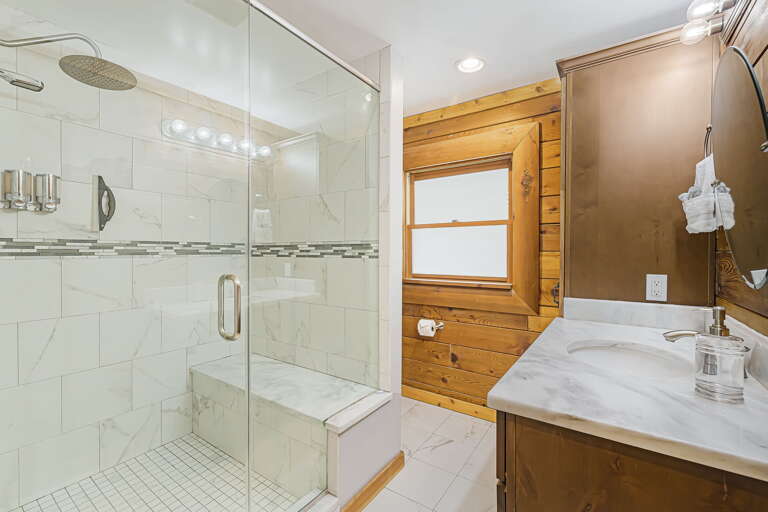 Main Suite/Bedroom One - Attached Shower w/ Seating