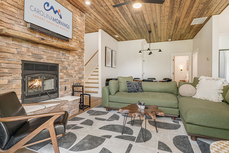 Main Level - Living Area w/ Smart TV & Wood Burning Fireplace