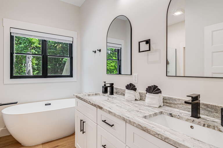 Main Suite/Bedroom One - Attached Full Bath w/ Soaking Tub & Dual Vanities