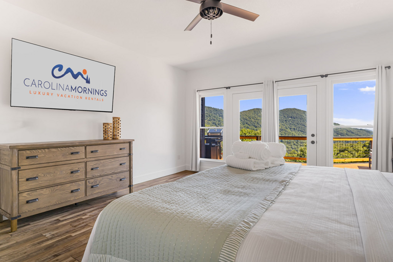 Main Suite/Bedroom One - King Bed w/ Deck Access and Smart TV