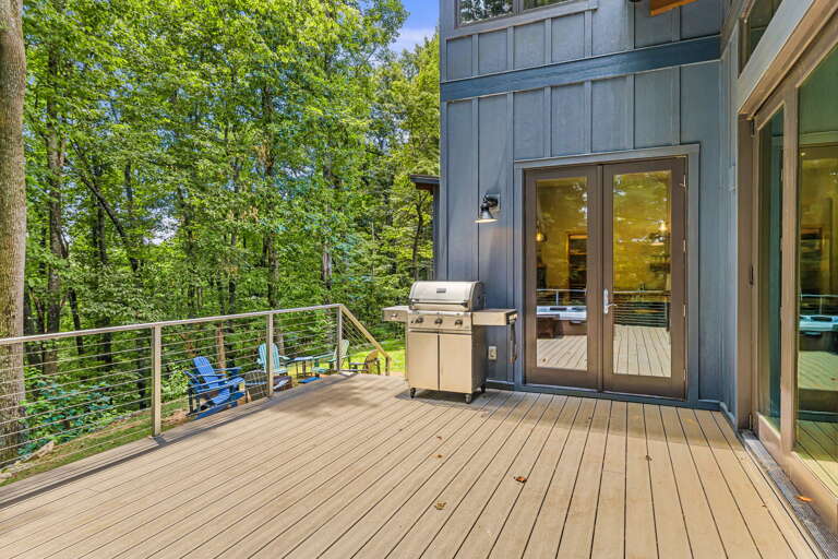 Deck w/ Gas Grill & Stairs To Fire Pit Area Deck w/ Gas Grill & Stairs To Fire Pit Area