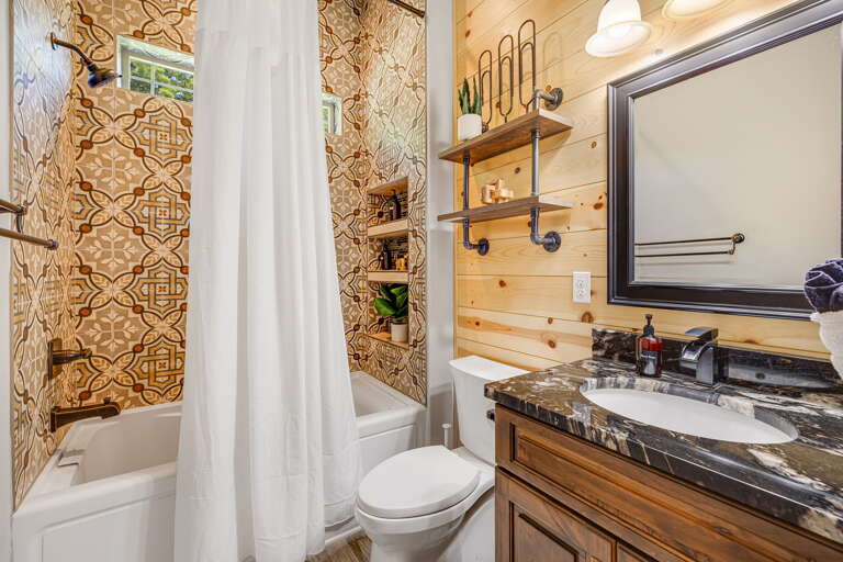 Main Level - Shared Full Bath Main Level - Shared Full Bath