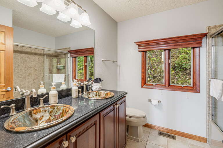 Main Level - Shared Full Bath W/ Dual Vanities