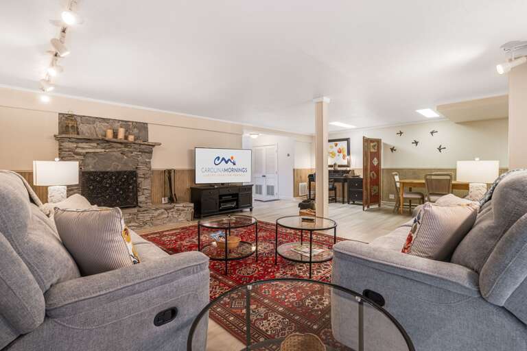 Living Area w/ Gas Fireplace & Smart TV