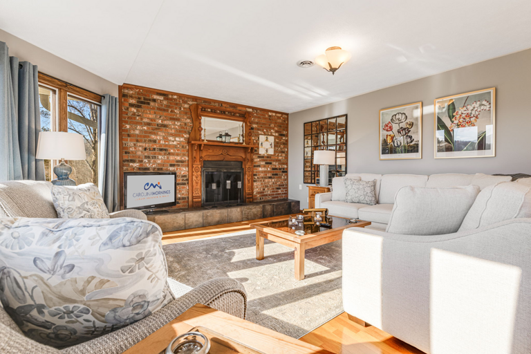 Main Level - Living Area w/ Gas Fireplace & Smart TV