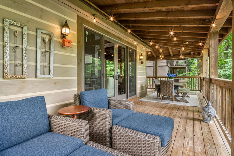 Covered Deck w/ Chaise Seating and Dining Area