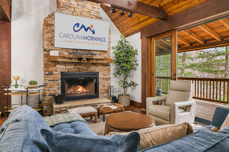 Living Area w/ Gas Fireplace & Deck Access