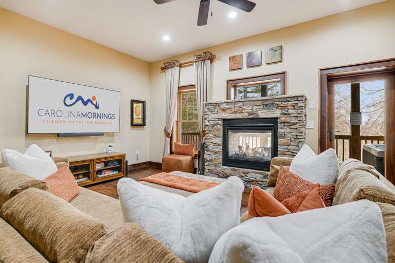 Lower Level - Living Area w/ Smart TV and Gas Fireplace