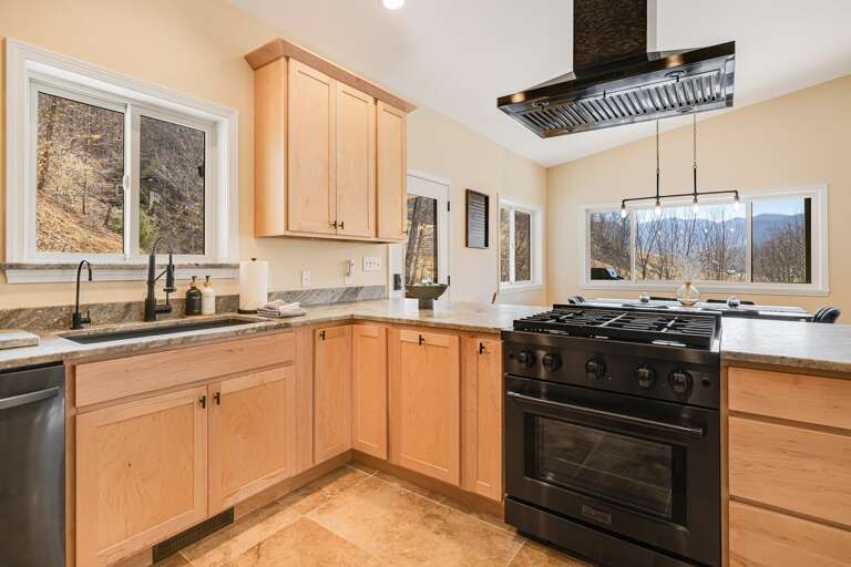 Chef's Kitchen w/ Gas Range & Hood