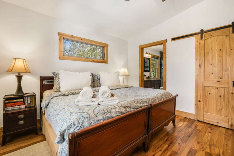 Serenade Shores - Main Level - Main Suite/Bedroom One - King Bed w/ Attached Shared Shower Bath w/ Dual Vanities