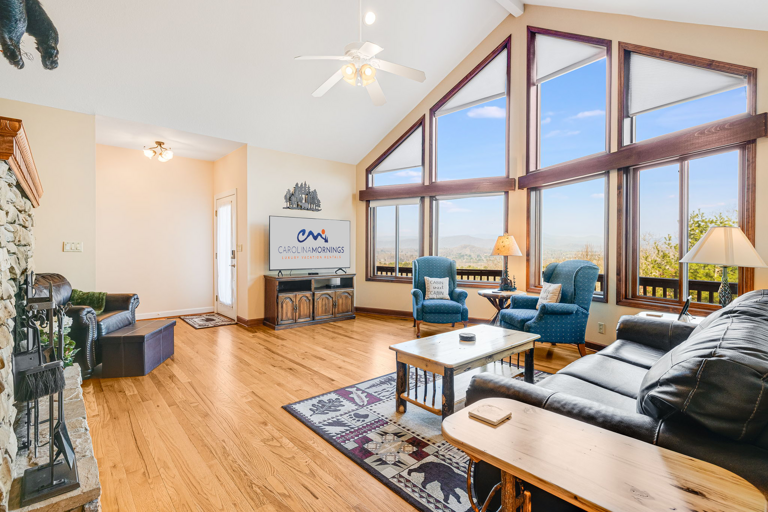 Main Level - Living Area w/ Floor To Ceiling Windows Main Level - Living Area w/ Floor To Ceiling Windows
