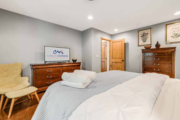 Main Suite/Bedroom One - King Bed w/ Smart TV