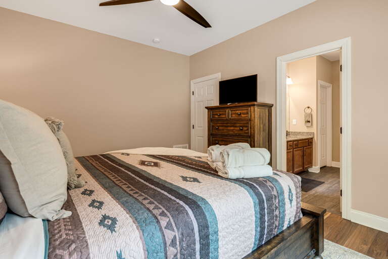 Main Suite/Bedroom One - King Bed w/ Smart TV & Attached Full Bath