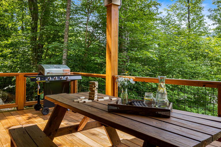 Covered Porch with Seating Area and Grill
