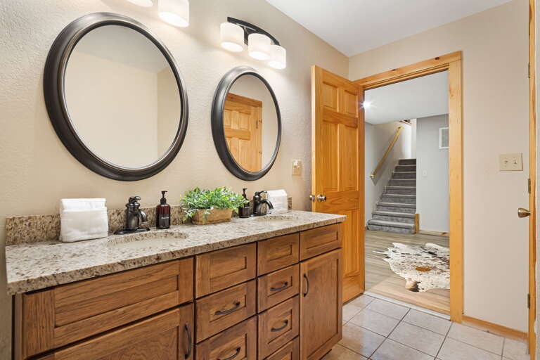 Lower Level - Shared Shower Bath w/ Dual Vanities
