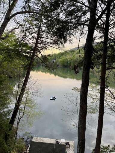 Morning Kayaking at Tranquility Lake House Morning Kayaking at Tranquility Lake House