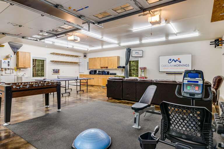 Garage Multi-Use Rec Room w/ Smart TV, Foosball, Ping Pong, and Exercise Area