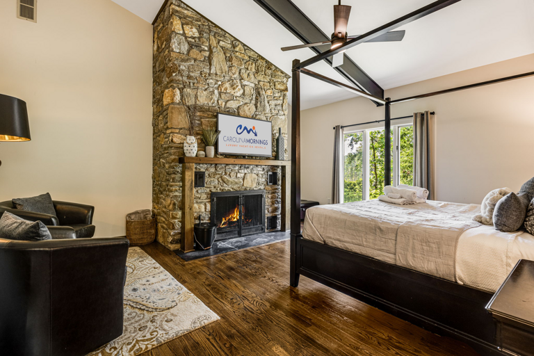 Main Suite/Bedroom One - King Bed w/ Wood Burning Fireplace and Smart TV