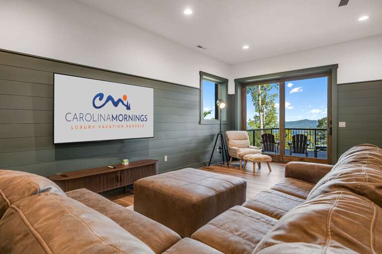 Lower Level - Living Area w/ Smart TV and Balcony Access