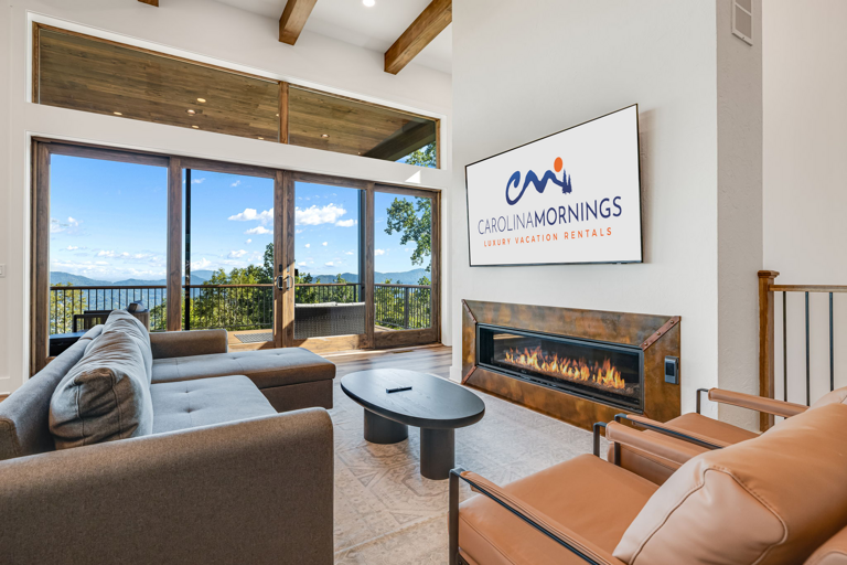 Main Level - Living Area w/ Smart TV, Linear Gas Fireplace, and Deck access Main Level - Living Area w/ Smart TV, Linear Gas Fireplace, and Deck access