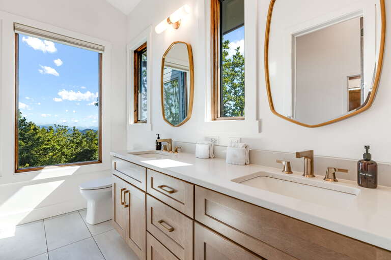 Main Suite/Bedroom One - Attached Shower Bath w/ Dual Vanities