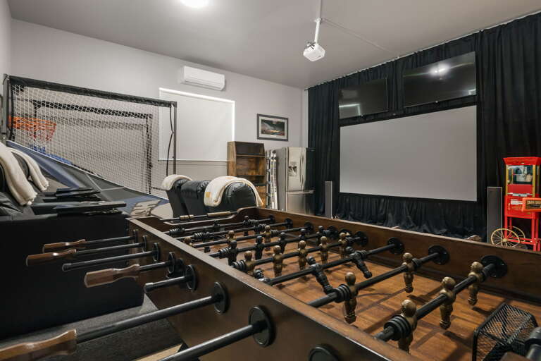 Main Level - Theatre Game Room w/ Foosball Table & Basketball Game