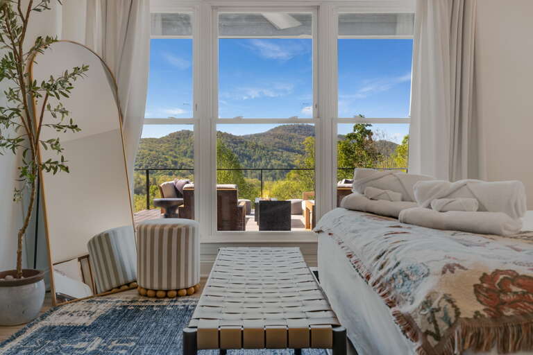 Sweeping Mountain Peaks From Your Bedroom