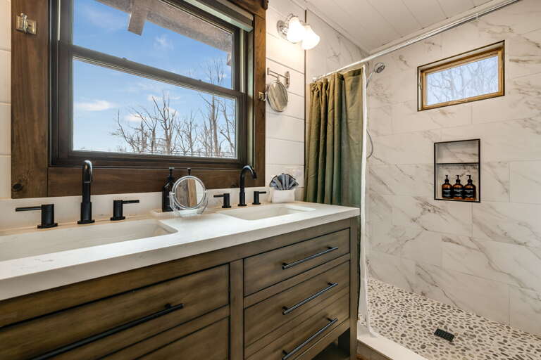Main Suite/Bedroom Two - Attached Shower Bath w/ Dual Vanities