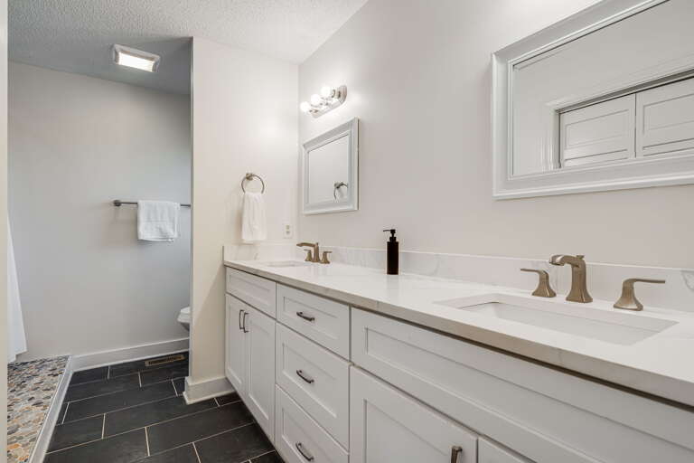 Main Suite/Bedroom One - Attached Full Bath w/ Dual Vanities