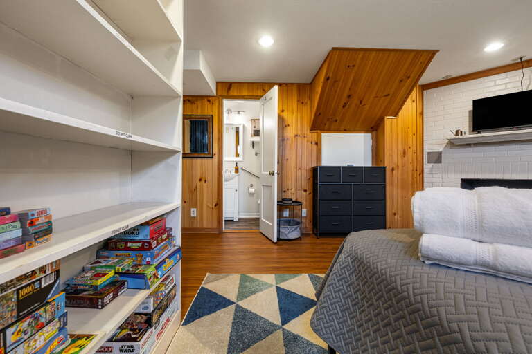 Main Suite/Bedroom Four - Attached Full Bath & Board Games/Puzzles