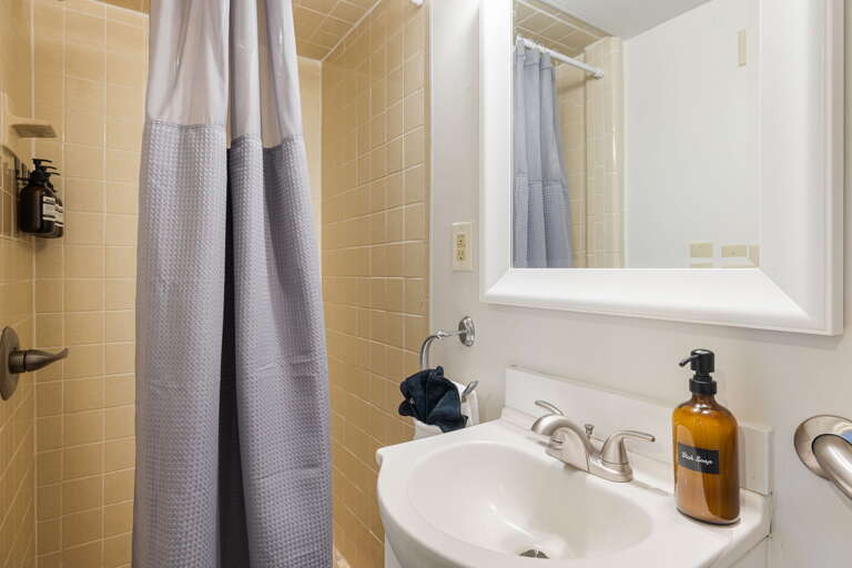 Main Suite/Bedroom Four - Attached Shower Bath