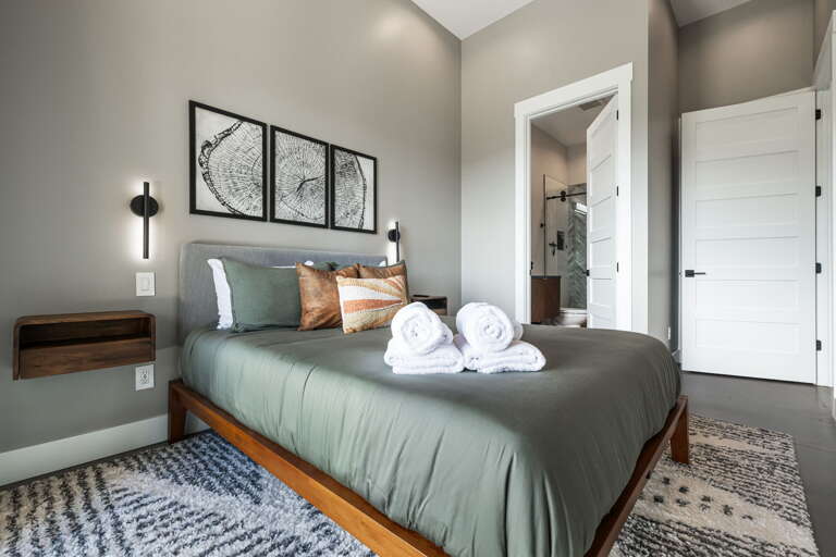 Main Suite/Bedroom Three - Queen Bed w/ Attached Shower Bath
