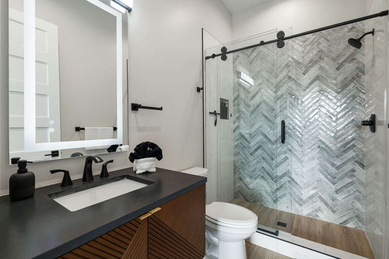 Main Suite/Bedroom Three - Attached Shower Bath