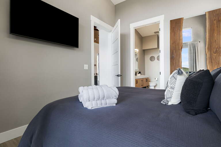 Main Suite/Bedroom One - King Bed w/ Smart TV & Attached Shower Bath