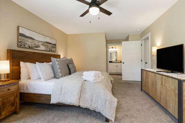 Main Suite/Bedroom One - King Bed w/ Attached Full Shower Bath and Smart TV
