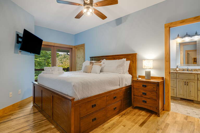 Bedroom One - King Bed w/ Smart TV, Deck Access, and Attached Jack and Jill Full Bath
