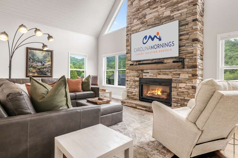 Main Level - Living Area w/ Gas Fireplace and Smart TV