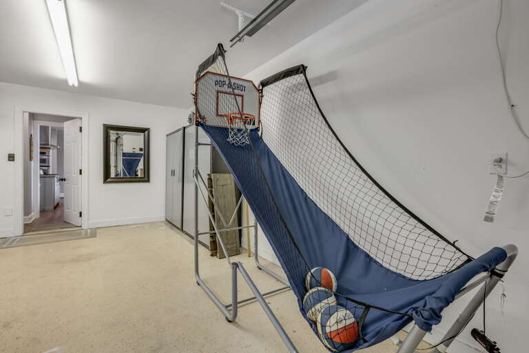 Game Area w/Basketball Hoop In Garage