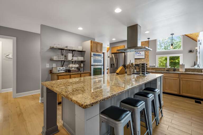 Main Level - Fully Equipped Kitchen w/ Breakfast Bar Seating
