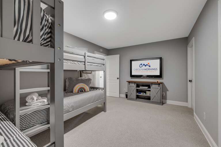 Bedroom Five - Four Twin Bunk Beds w/ Smart TV
