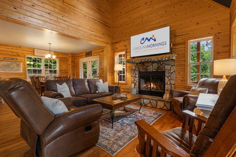 Living Area w/ Wood Burning Fireplace and Smart TV