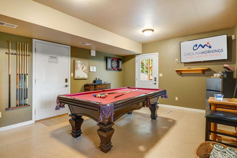 Lower Level - Recreation Area w/ Pool Table, Dart Board, Smart TV, and Lower Deck Access