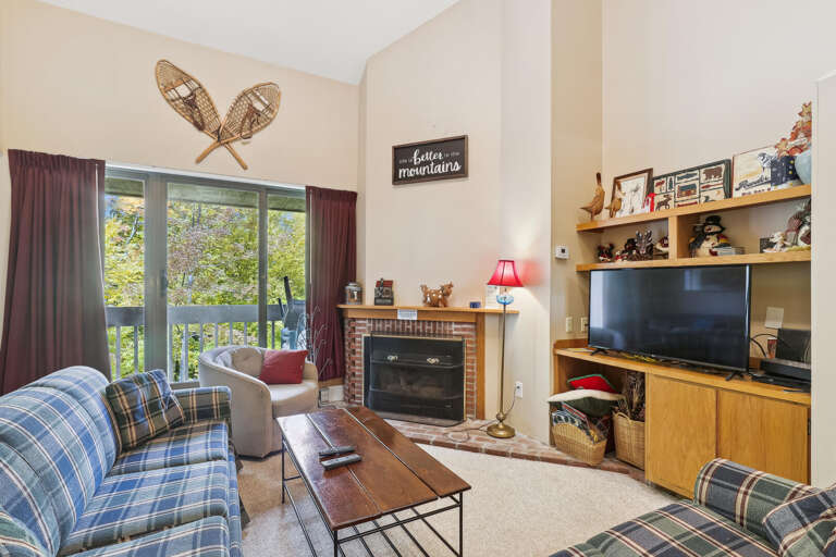Spacious Living Room With Fireplace And Plaid Sofas, Vacation Rental
