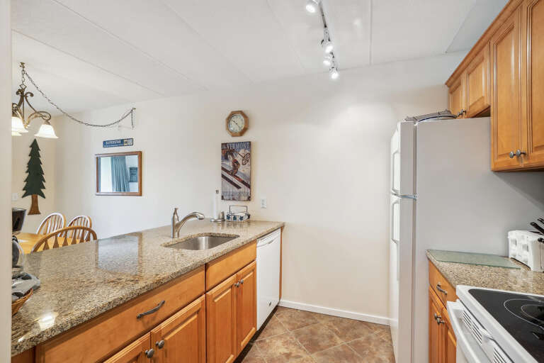 Bright Kitchen, Beige Tiles, Wooden Cabinets, White Appliances