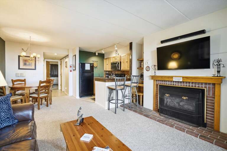 Spacious Living Room Leading To A Kitchen In A Vacation Rental