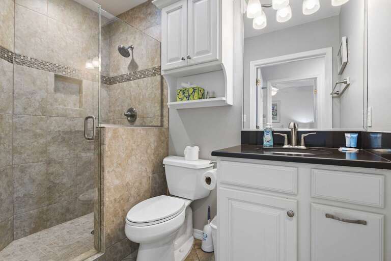 guest bathroom with walk in shower